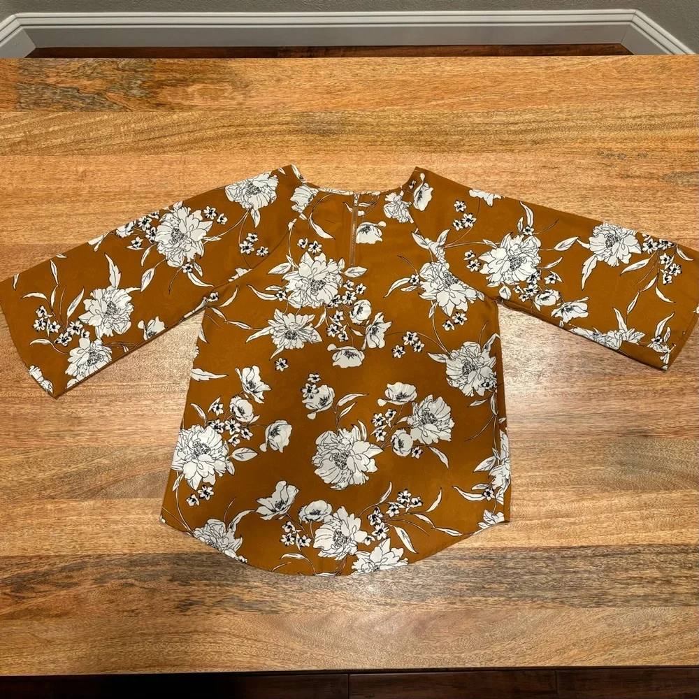 Brown, Cream and Black floral print blouse with a zipper in the back. - Picture 3 of 3
